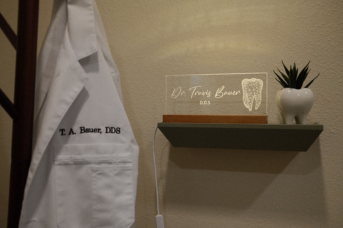 Personalized Dr. Travis Bauer office display at Hometown Dental Co.