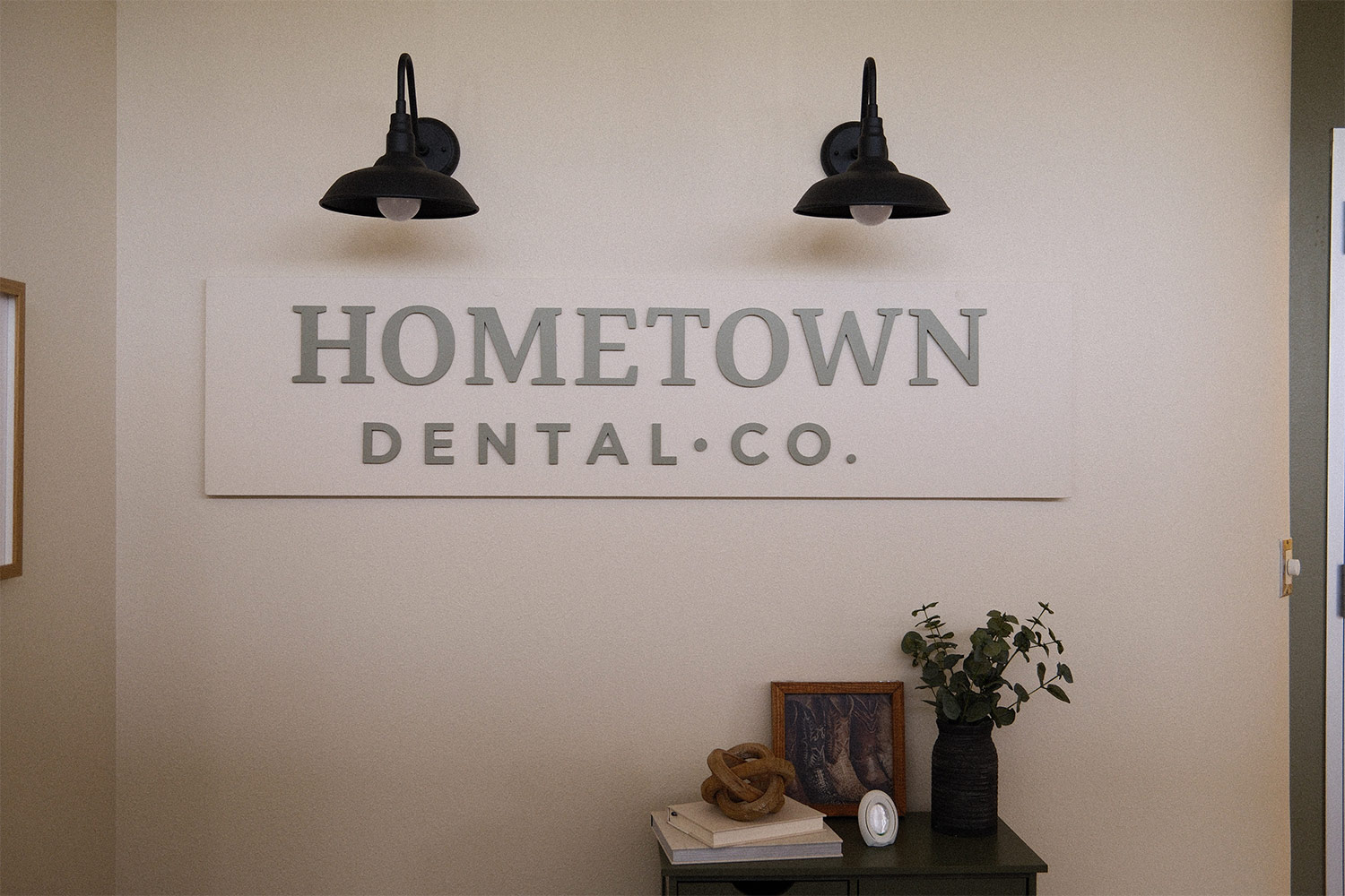 Hometown Dental Co. waiting room wall sign