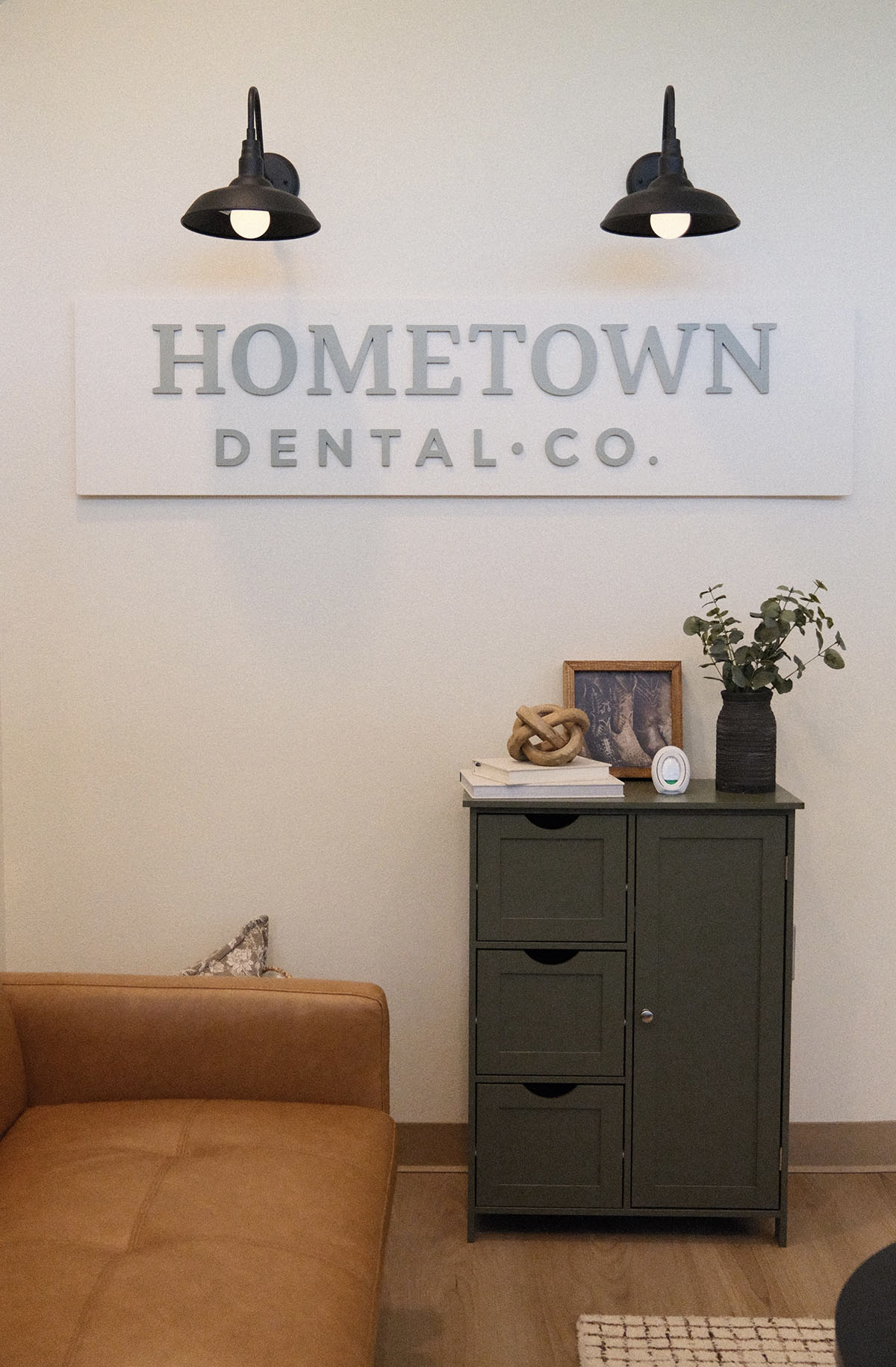 Hometown Dental Co. sign in the Bastrop dental office waiting room